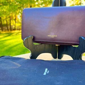 Saint Laurent Maroon wallet with gold hardware